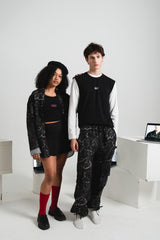 Male model is 188 cm / 6'2 ft tall and wears cargo pants size M. 

Woman model is 169cm / 5'54 Ft wears shirt size M. 